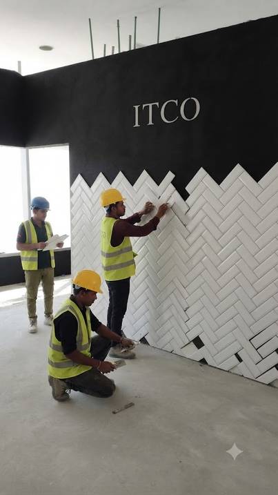 ITCO team installing herringbone tiles