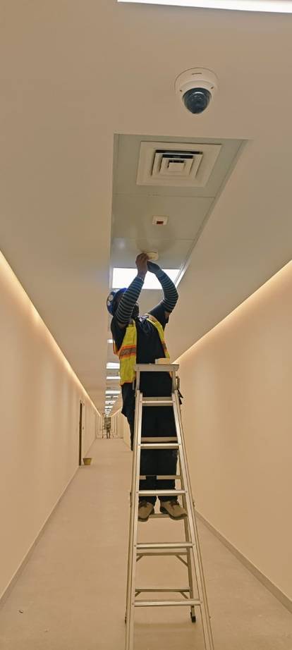 Electrician wiring a distribution board